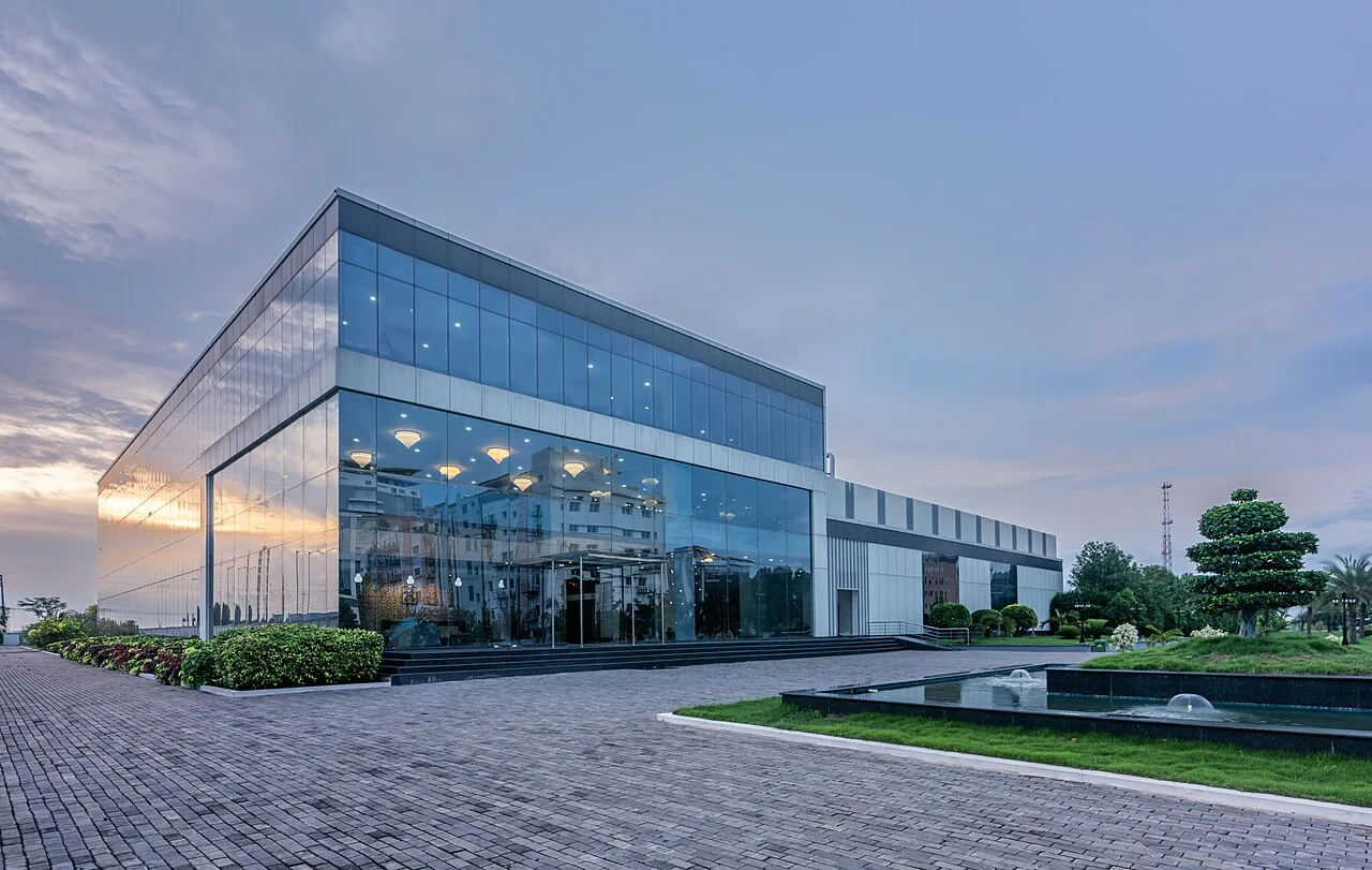 Exterior view of a modern data center campus, representing the physical infrastructure behind large-scale AI deployment.